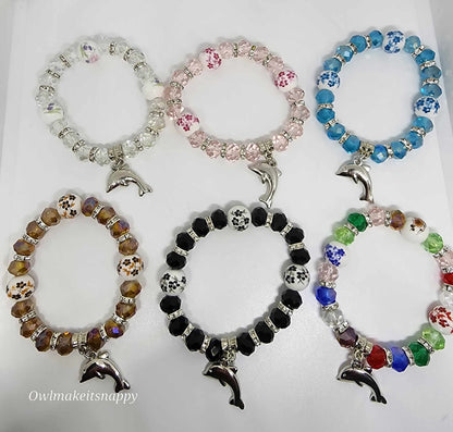 Glass beads with dolphin charm bracelet