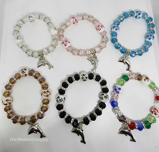 Glass beads with dolphin charm bracelet