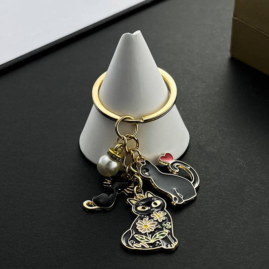 Cartoon Pearl Heart Black Cat Keychain